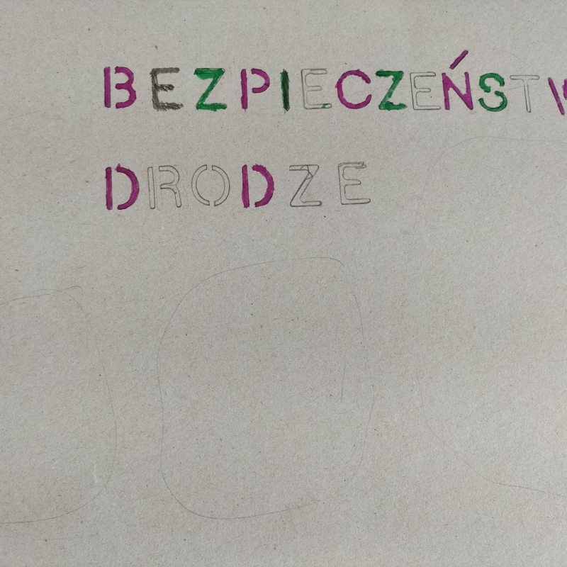 Twórczy napis bezpieczeństwo na drodze