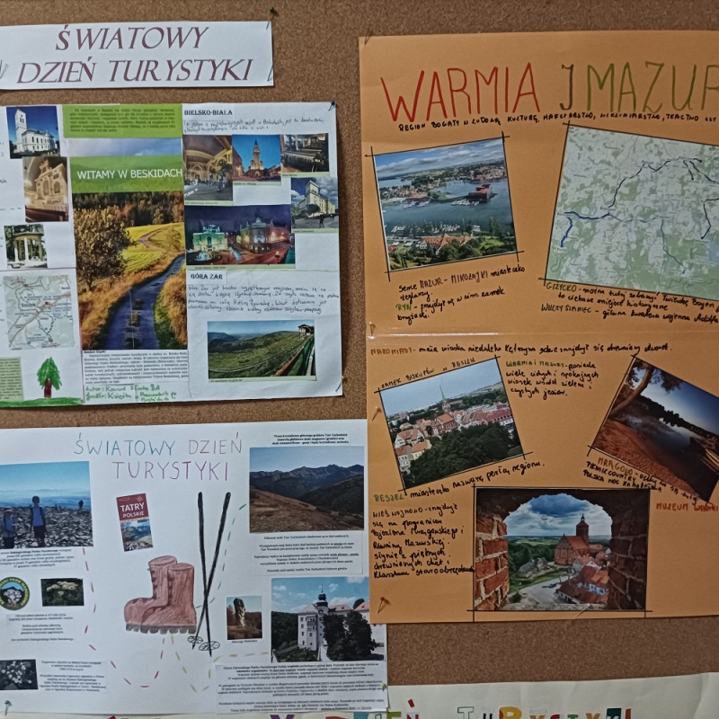Plakaty ze światowego dnia turystyki przypięte na gazetce